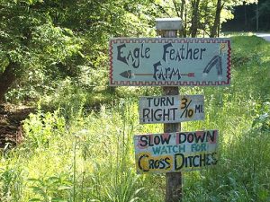 eagle feather farm roadside sign